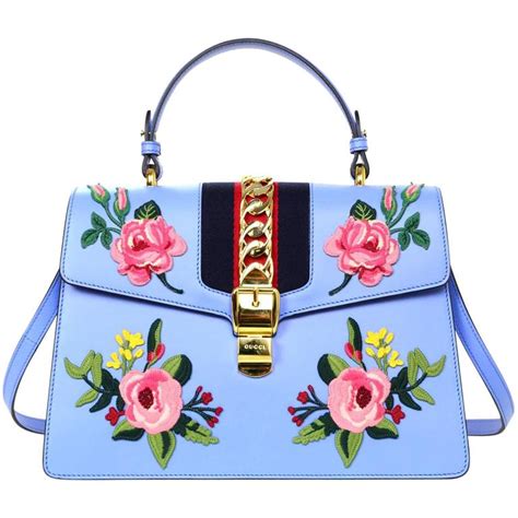 blue gold gucci bag|gucci bag blue flowers.